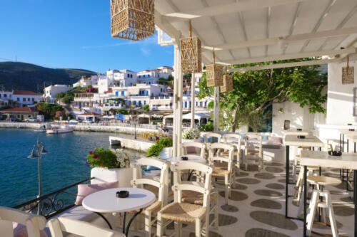 View from the seaside restaurant in picturesque village of Batsi on  Andros island, Cyclades, Greece